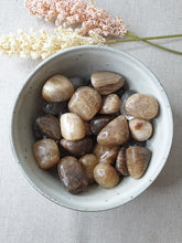 Load image into Gallery viewer, aragonite Tumble Stones in a bowl
