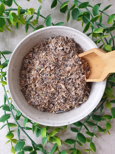 Irish Moss in a bowl with wooden scoop