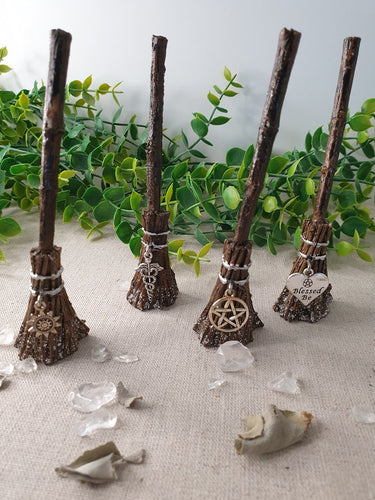 Witches Broomsticks near crystals and leaves