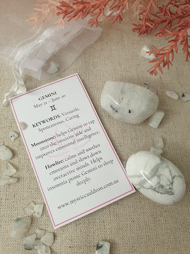 Gemini Crystals and meaning card surrounded by crystal chips